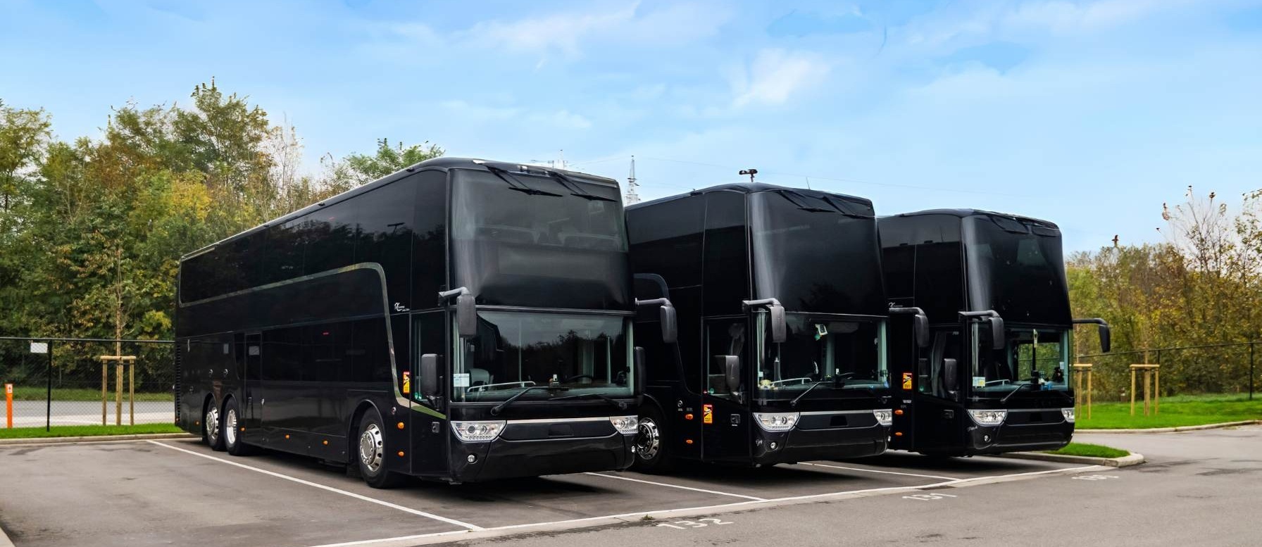 black modern coaches on a parking
